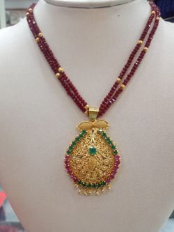 3.Beautiful locket with art Ruby and crytals beads chain